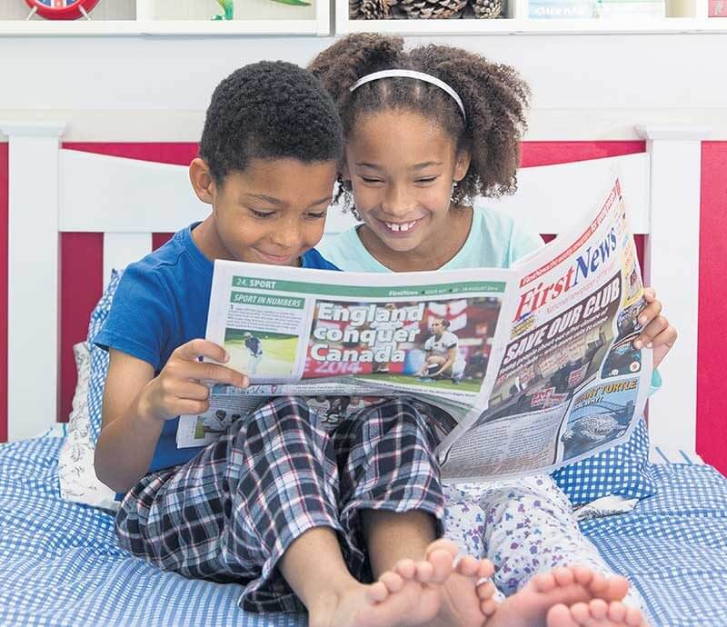 Children reading first news
